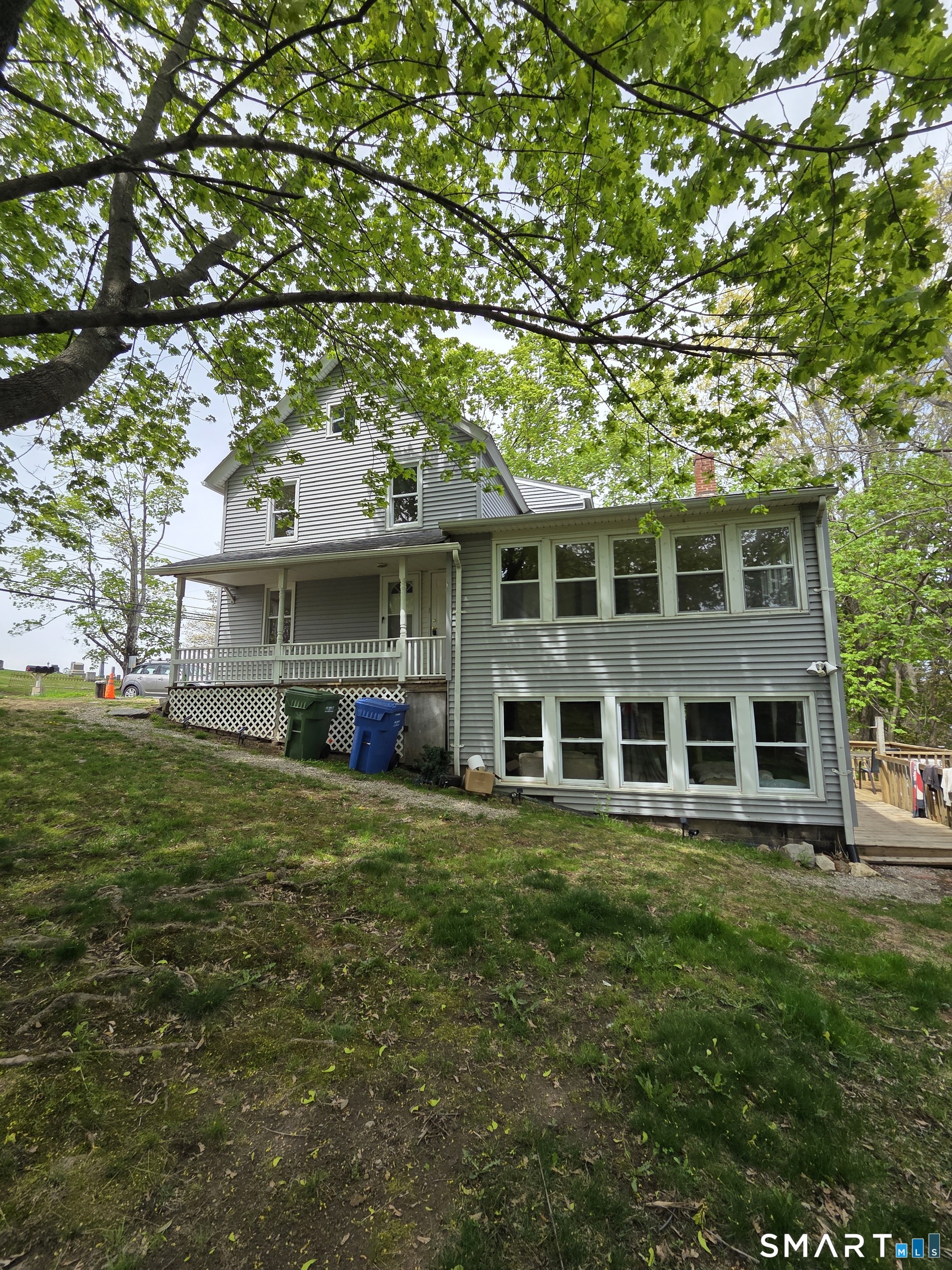 22 Lakeview Street, Unit 1 East Hampton, CT 06424 - Photo 20 of 20 a front view of a house with a garden