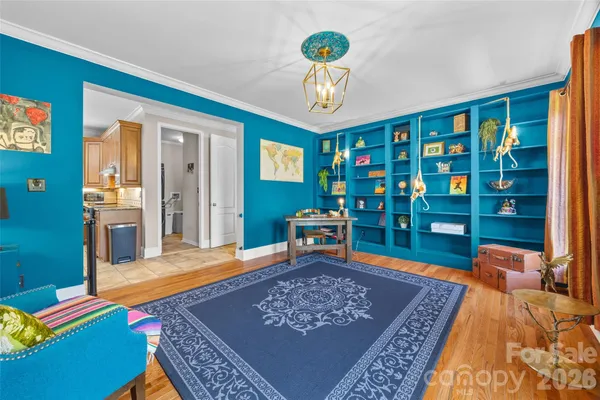 a room with furniture and a rug
