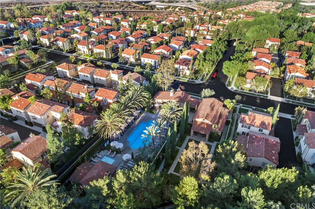 61 Bellwind Irvine, CA 92603 - Photo 12 of 17 an aerial view of residential houses with outdoor space and street view