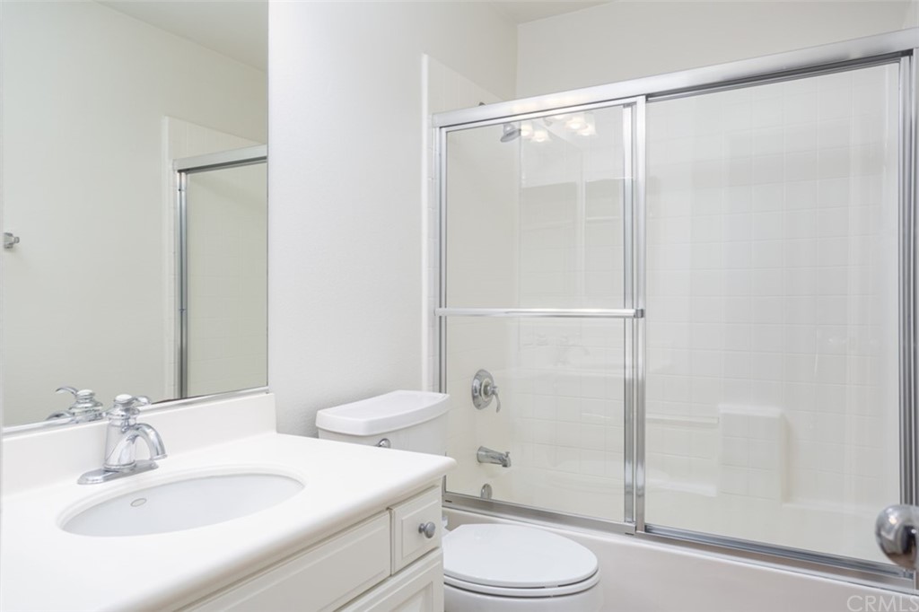 61 Bellwind Irvine, CA 92603 - Photo 8 of 17 a bathroom with a sink toilet and shower