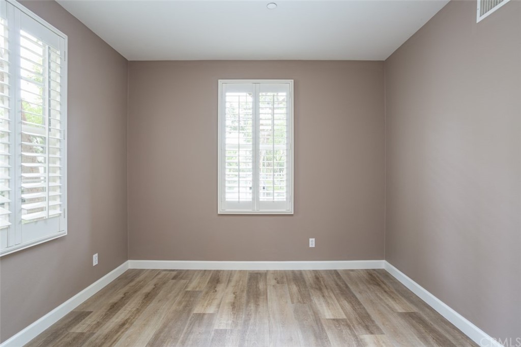 61 Bellwind Irvine, CA 92603 - Photo 9 of 17 an empty room with a window