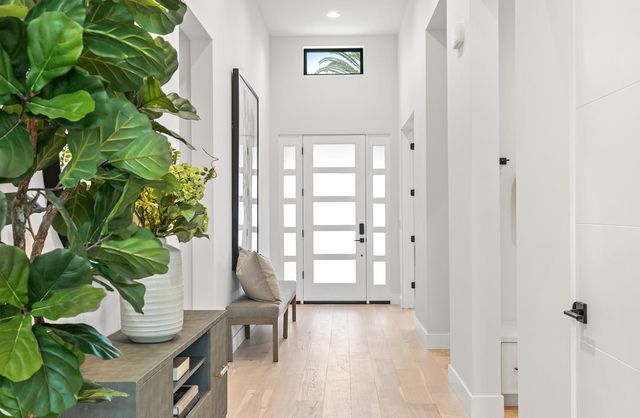 a view of entryway with wooden floor