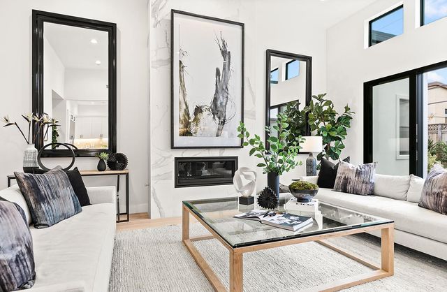 a living room with furniture and a table