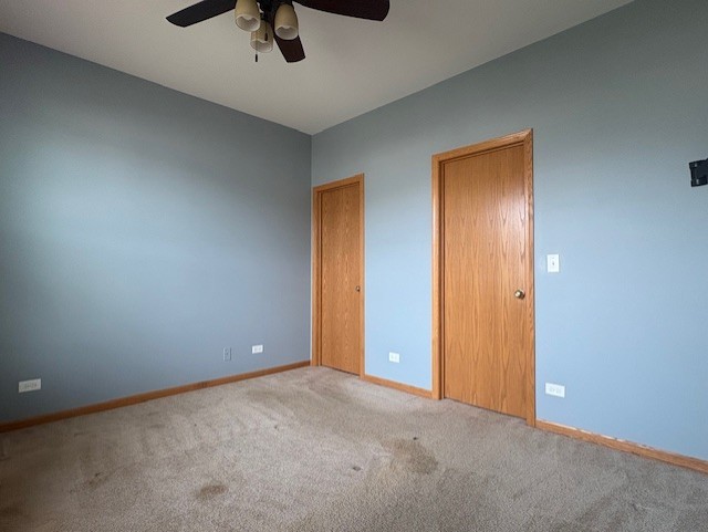 211 Leah Court Sycamore, IL 60178 - Photo 13 of 29 an empty room with closet and fan