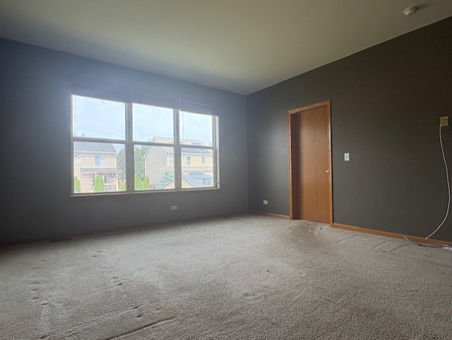 211 Leah Court Sycamore, IL 60178 - Photo 16 of 29 an empty room with windows