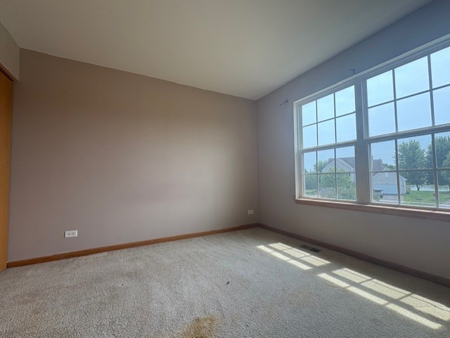 211 Leah Court Sycamore, IL 60178 - Photo 23 of 29 an empty room with a window