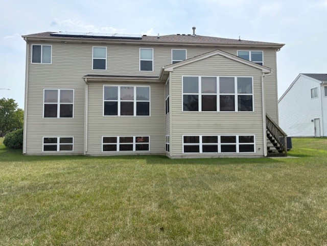 211 Leah Court Sycamore, IL 60178 - Photo 28 of 29 a front view of a house with a yard