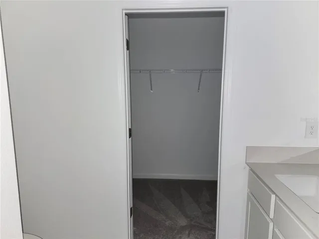 a bathroom with a sink and toilet