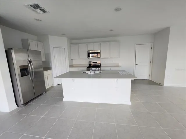 an empty room with a door