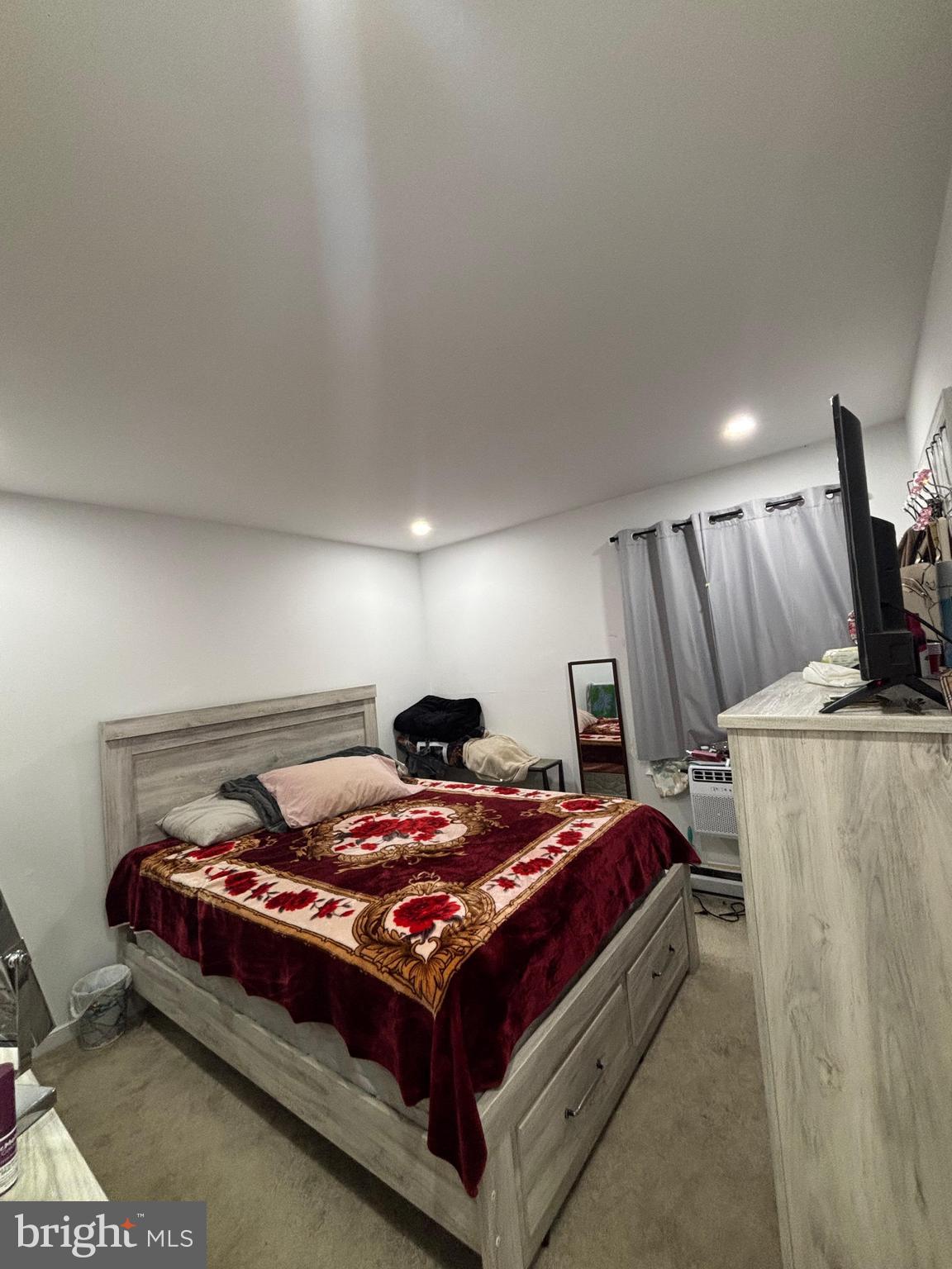 6004 Simplicity Court Chesterfield, VA 23832 - Photo 9 of 17 a bedroom with a bed and wooden floor