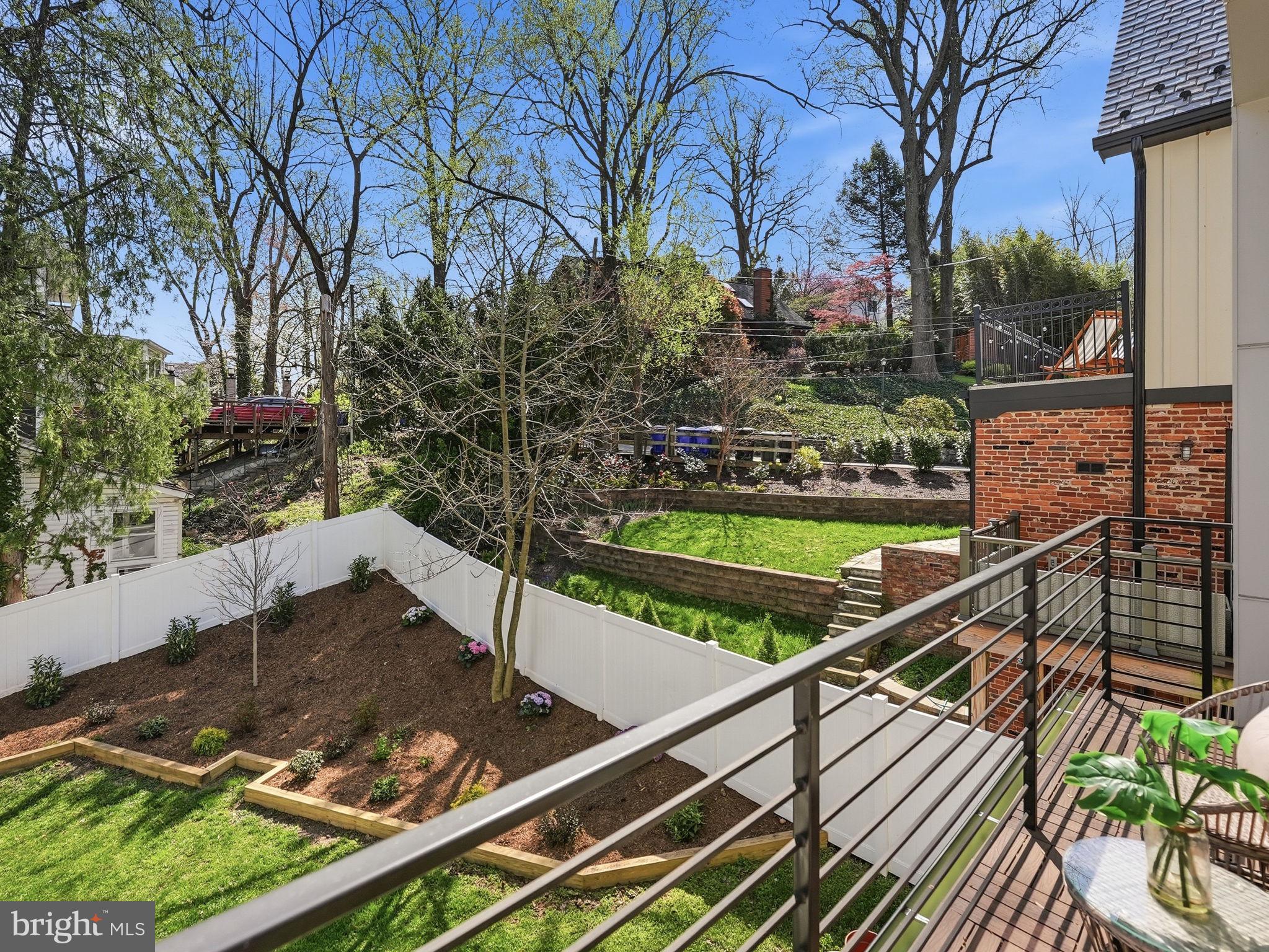 2211 Military Road Arlington, VA 22207 - Photo 101 of 107 Serene backyard oasis with lush greenery.