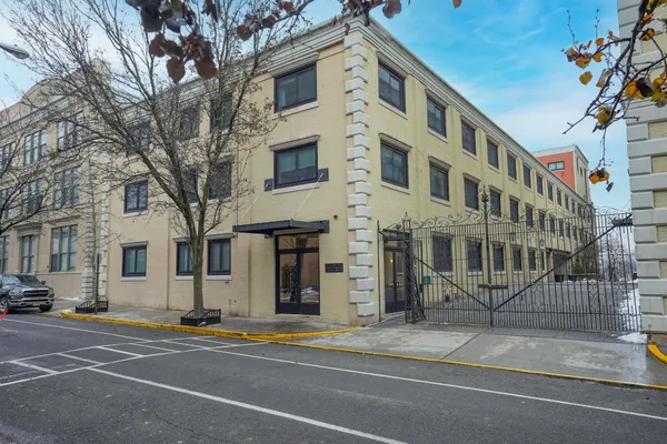 a view of a building with a street