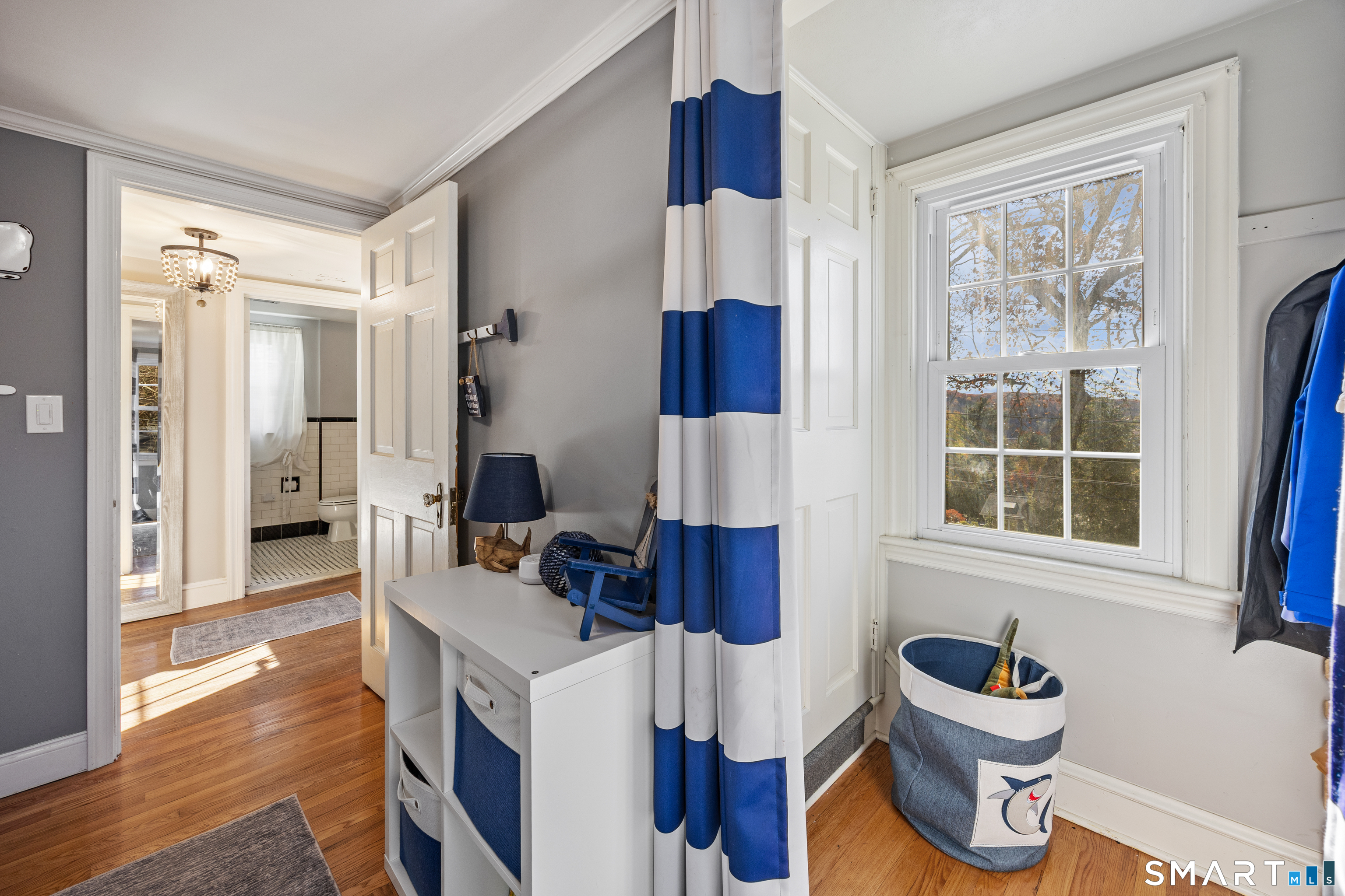232 High Street Thomaston, CT 06787 - Photo 14 of 31 a living room with furniture and a large window