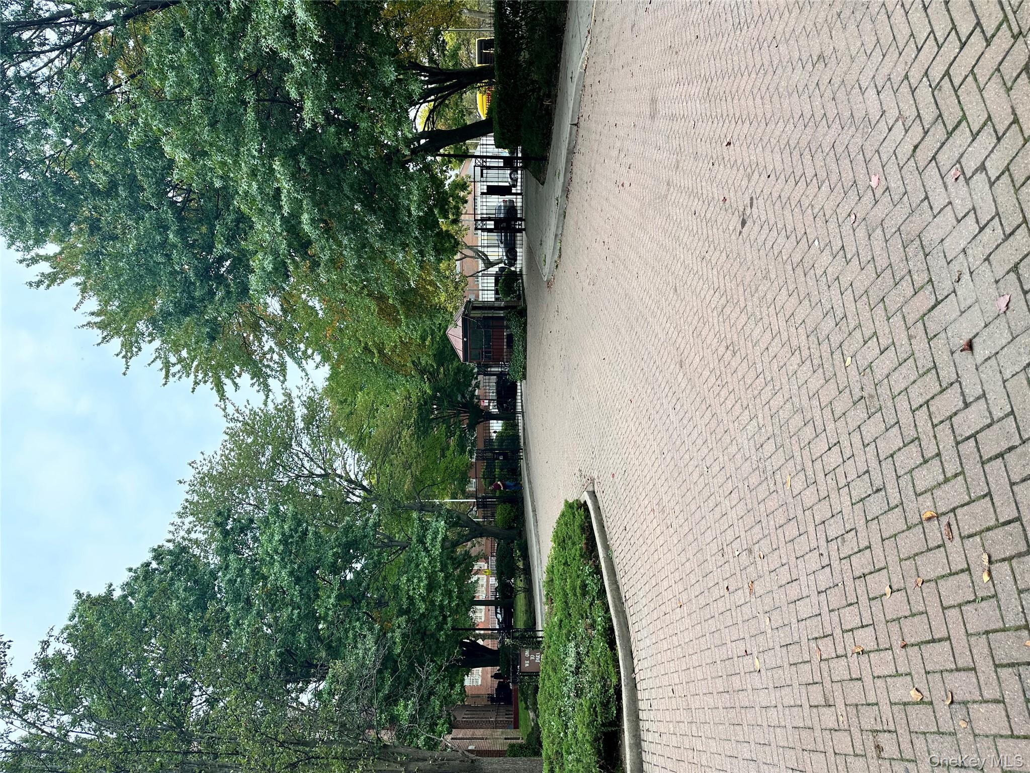 150-25 72nd Road, Unit 1J Queens, NY 11367 - Photo 9 of 14 a view of a street