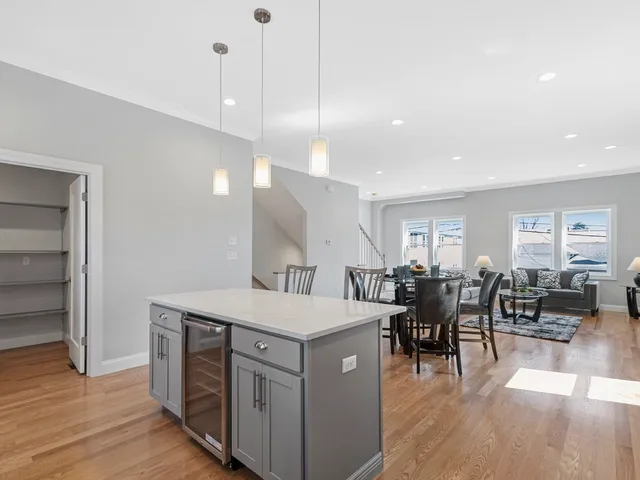a view of kitchen and dining area with furniture