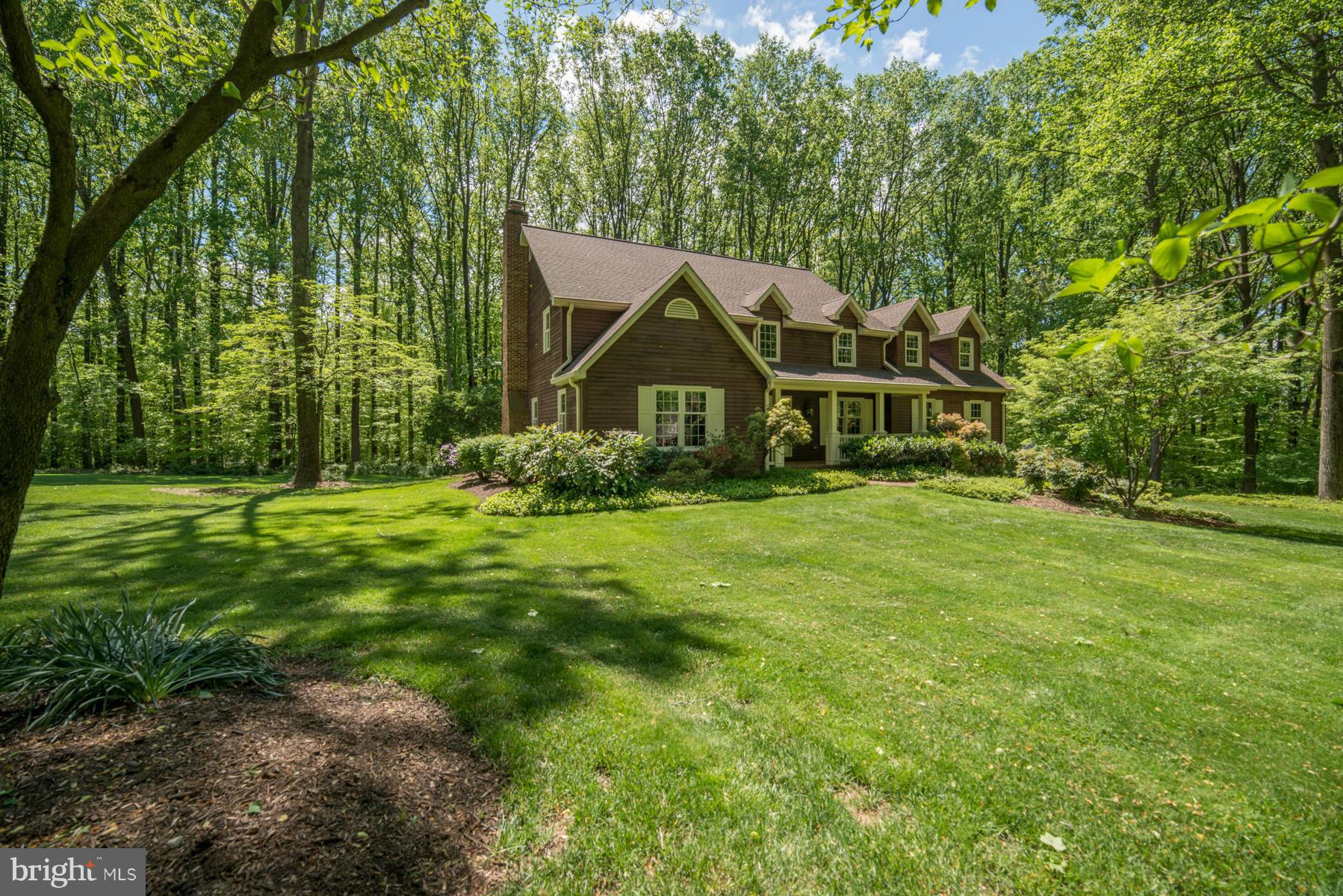 5 Wetherbee Court Phoenix, MD 21131 - Photo 2 of 29 a front view of a house with garden