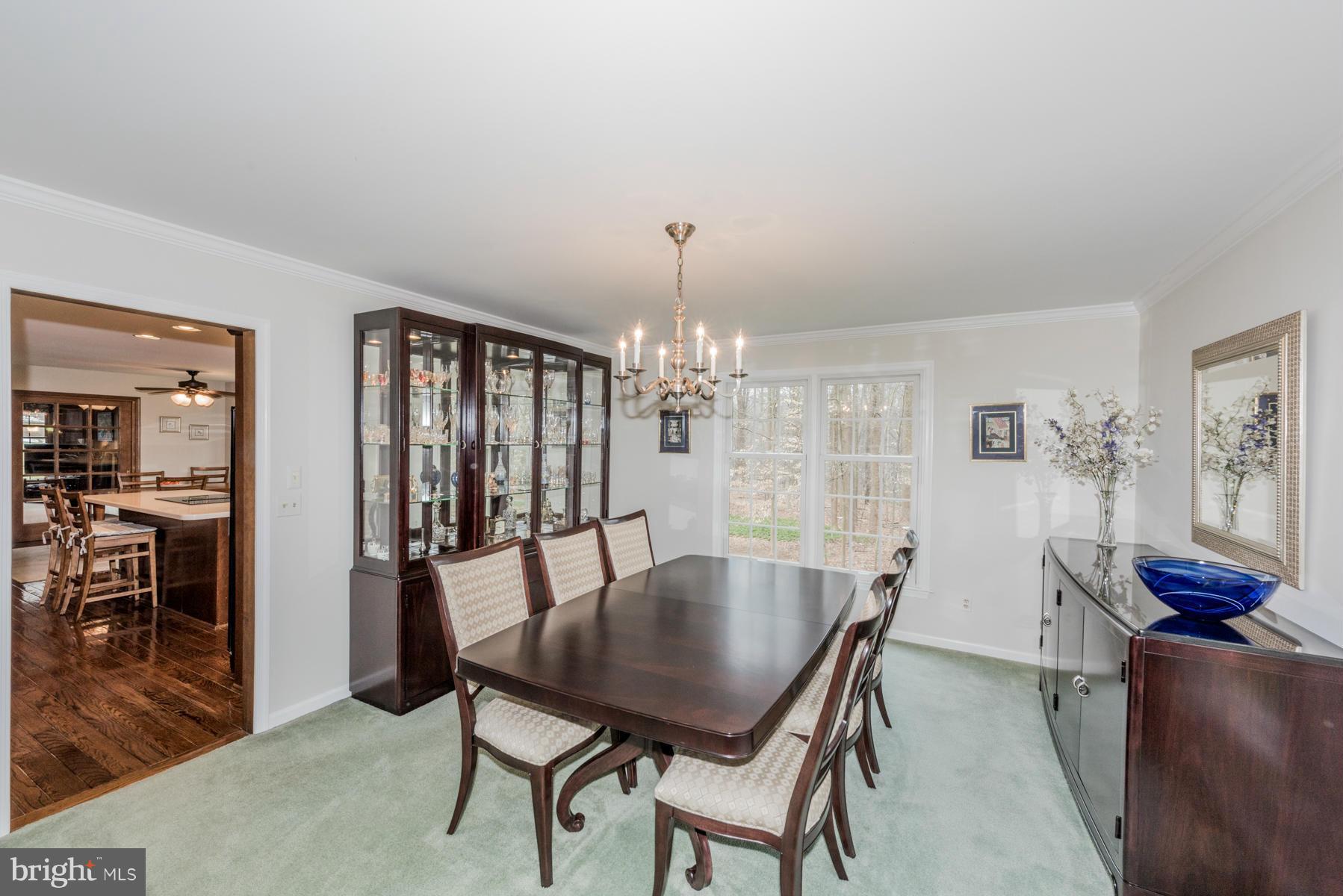 5 Wetherbee Court Phoenix, MD 21131 - Photo 17 of 29 a view of a dining room with furniture and wooden floor