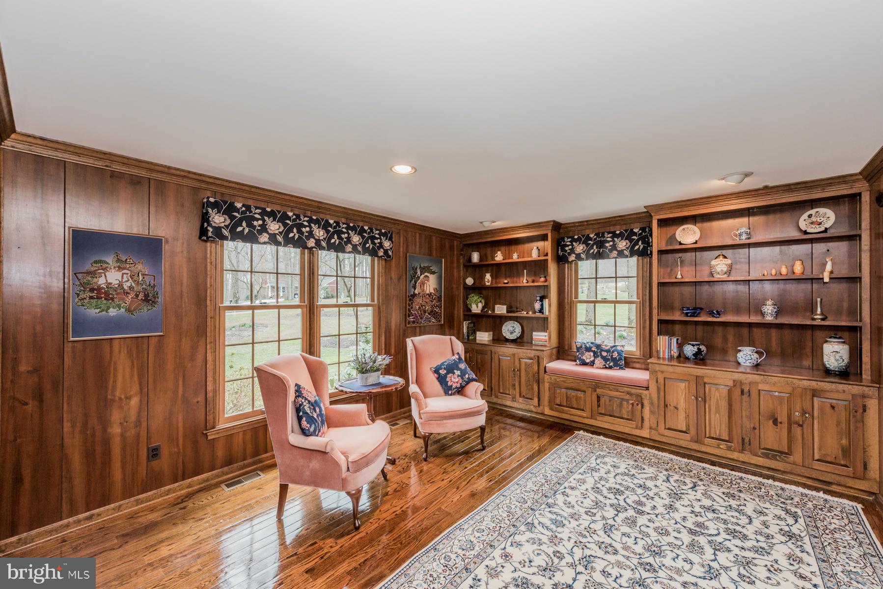 5 Wetherbee Court Phoenix, MD 21131 - Photo 10 of 29 a living room with furniture and a book shelf
