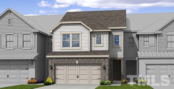 1347 Catch Fly Lane Durham, NC 27713 - Photo 1 of 12 a front view of a house with garage