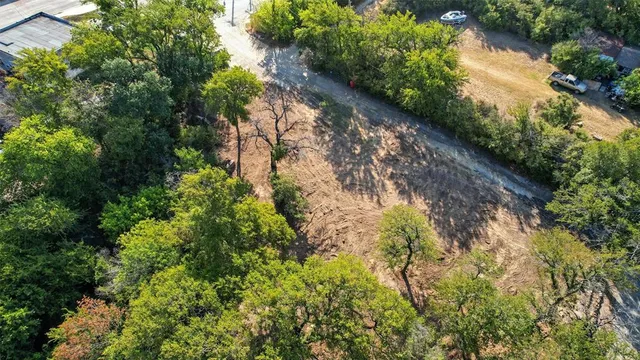 a view of a lake with green space