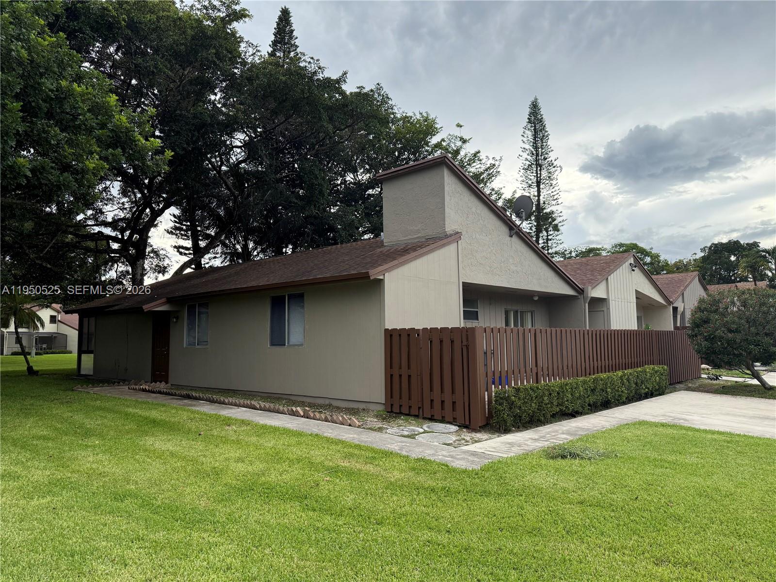 22279 Woodborn Drive Boca Raton, FL 33428 - Photo 2 of 19 a view of a backyard with a cabin