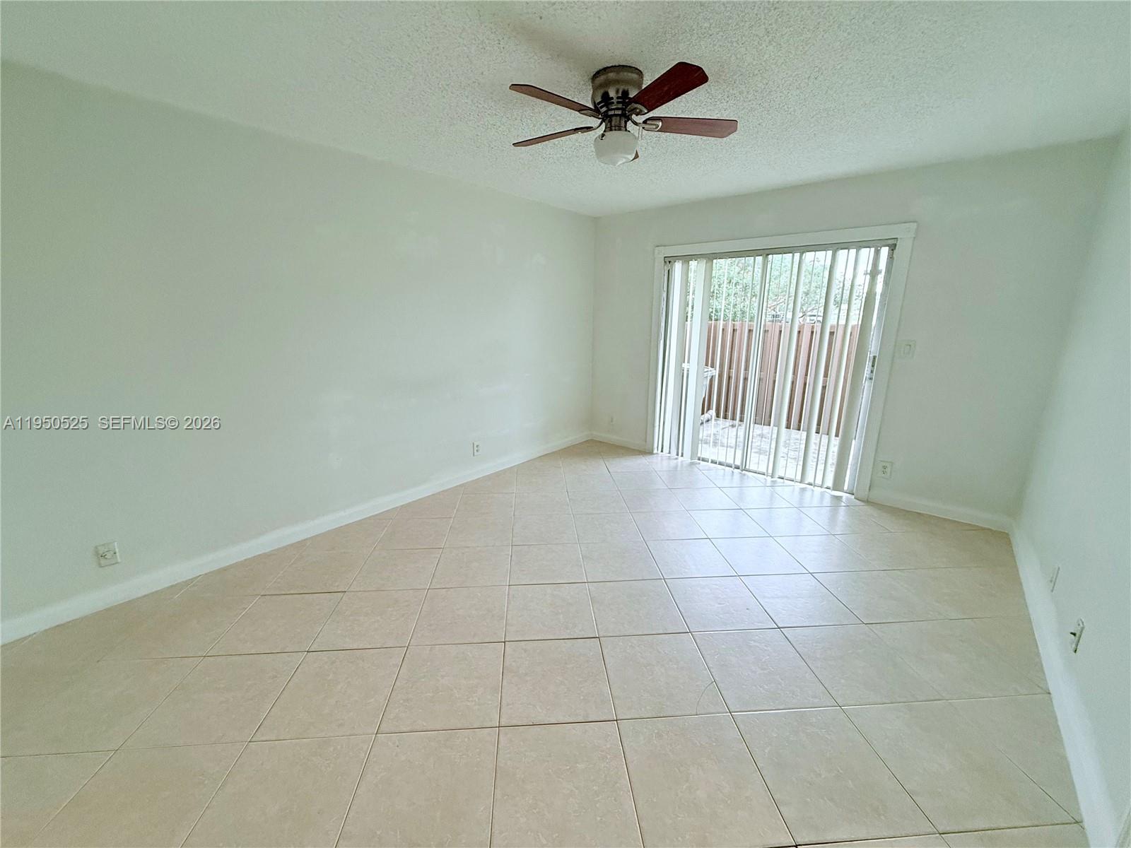 22279 Woodborn Drive Boca Raton, FL 33428 - Photo 8 of 19 a view of an empty room and a window