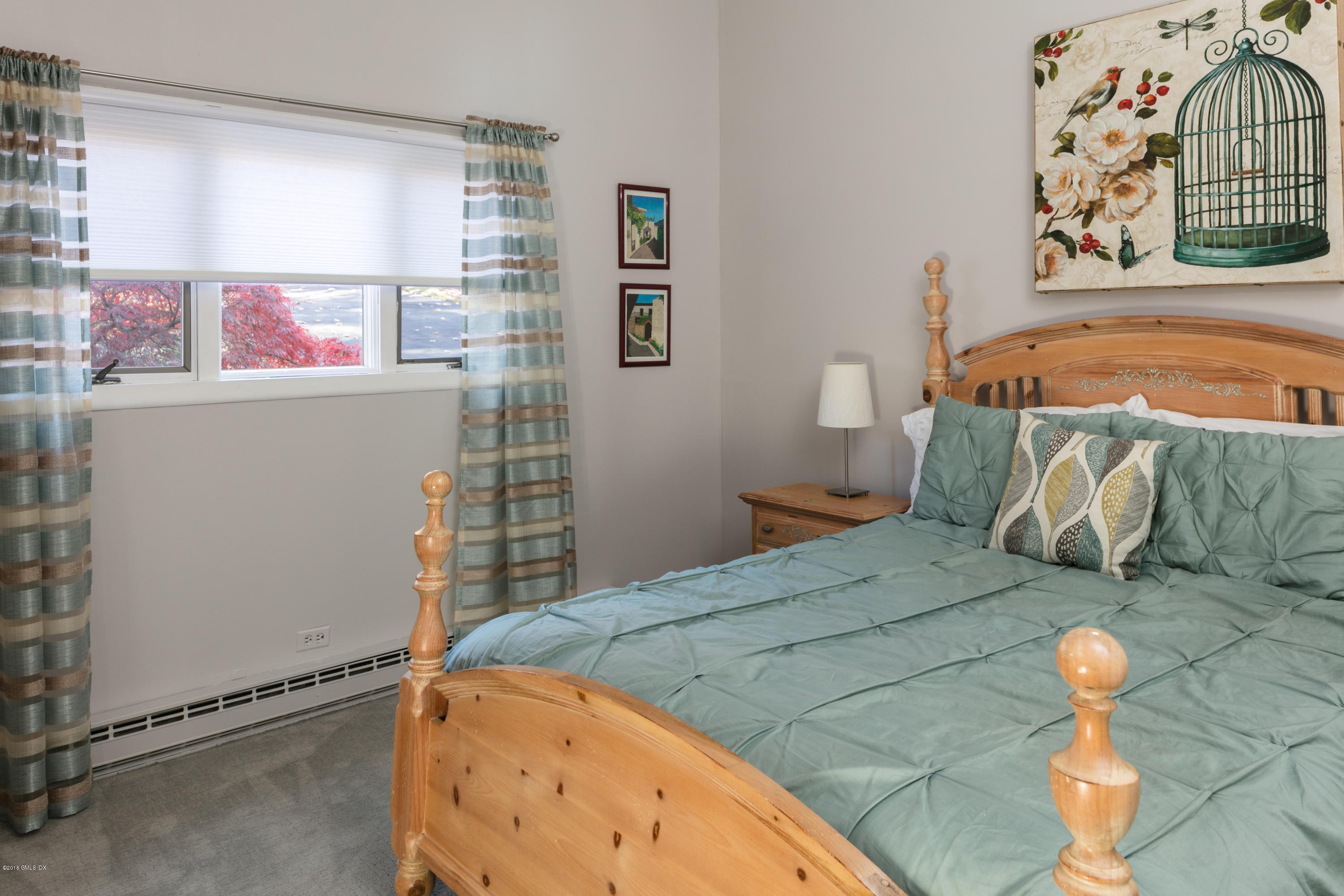7 Crawford Terrace Riverside, CT 06878 - Photo 11 of 19 a bedroom with a bed and a window