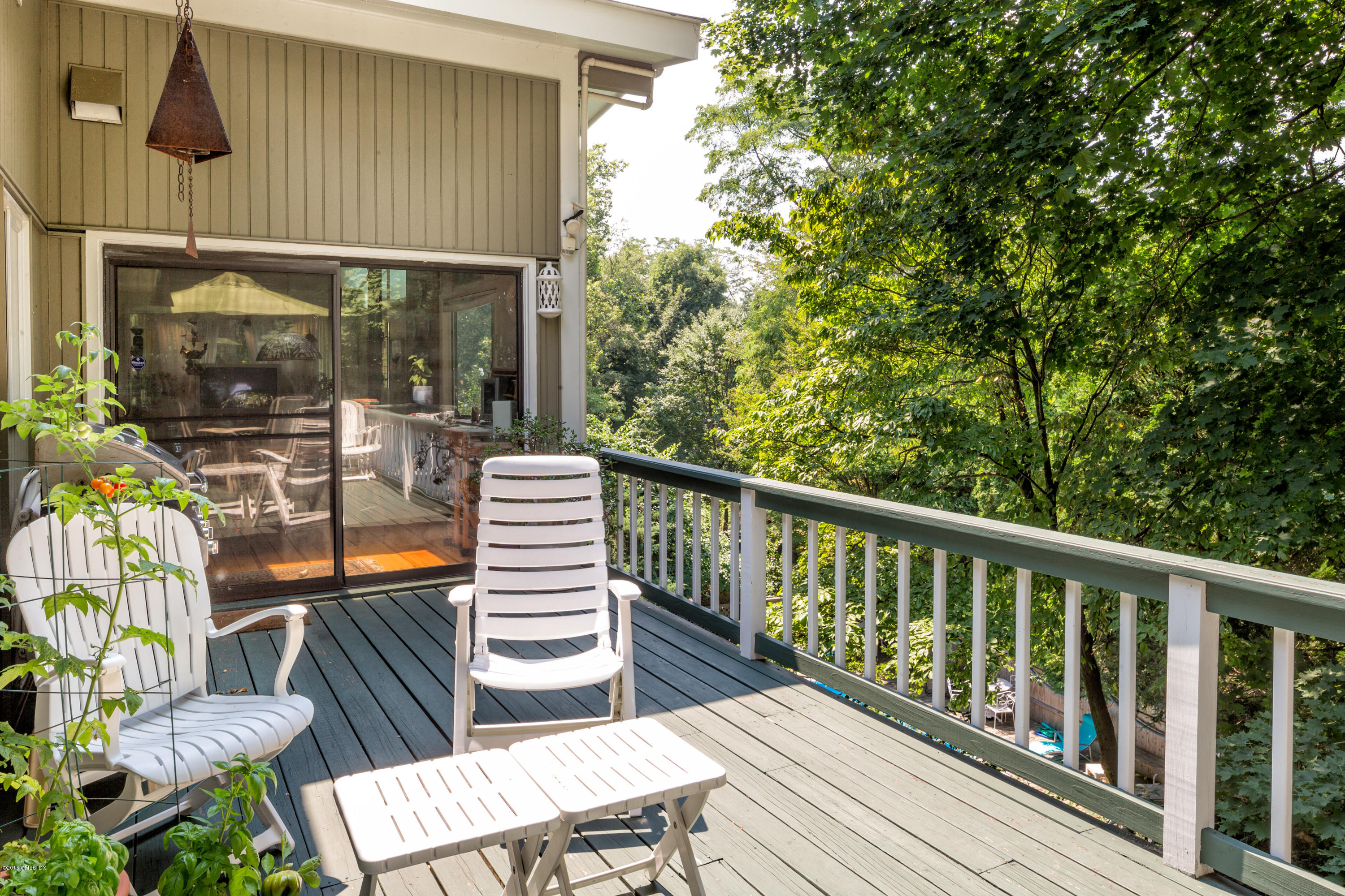 7 Crawford Terrace Riverside, CT 06878 - Photo 15 of 19 a view of a chairs and table in patio
