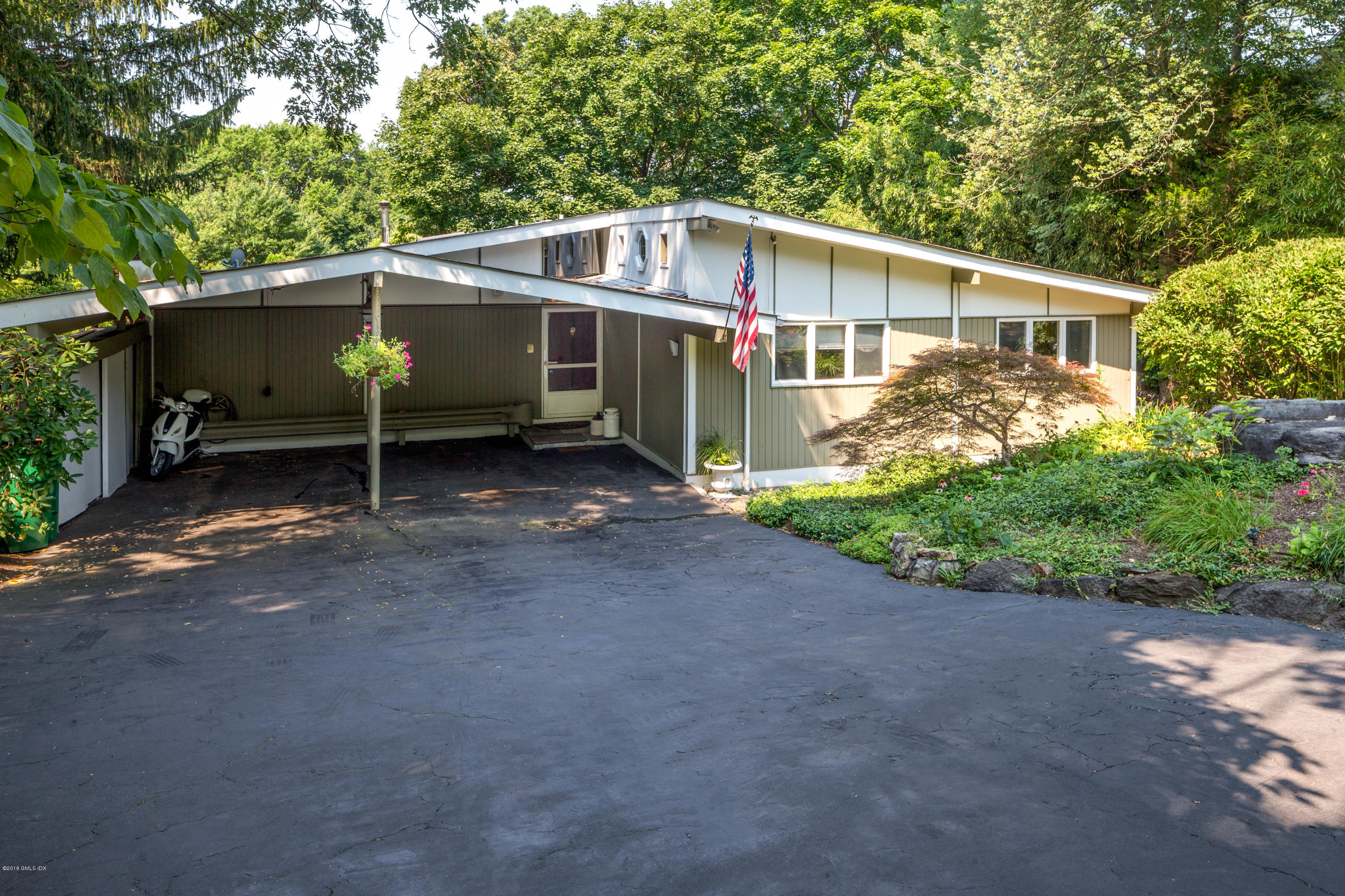 7 Crawford Terrace Riverside, CT 06878 - Photo 2 of 19 a view of a house next to a yard