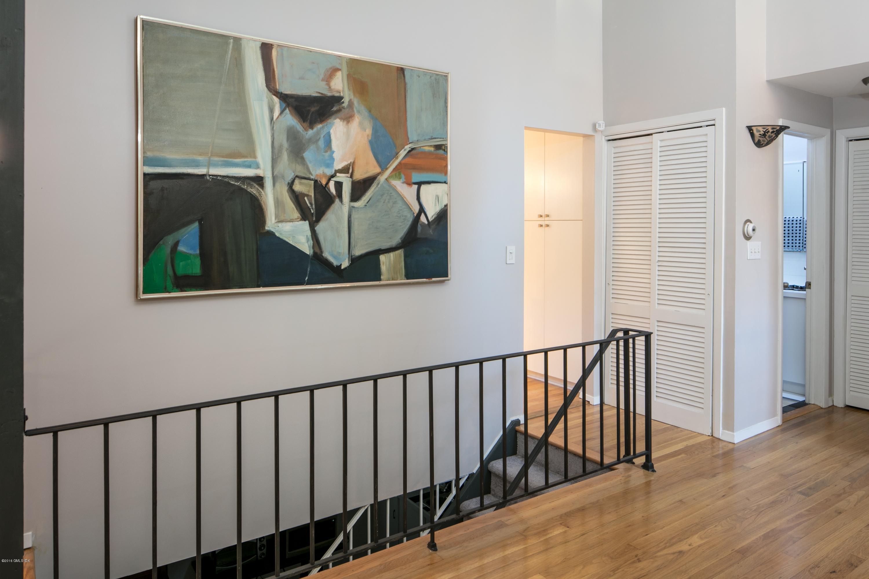 7 Crawford Terrace Riverside, CT 06878 - Photo 3 of 19 a view of a hallway and wooden floor