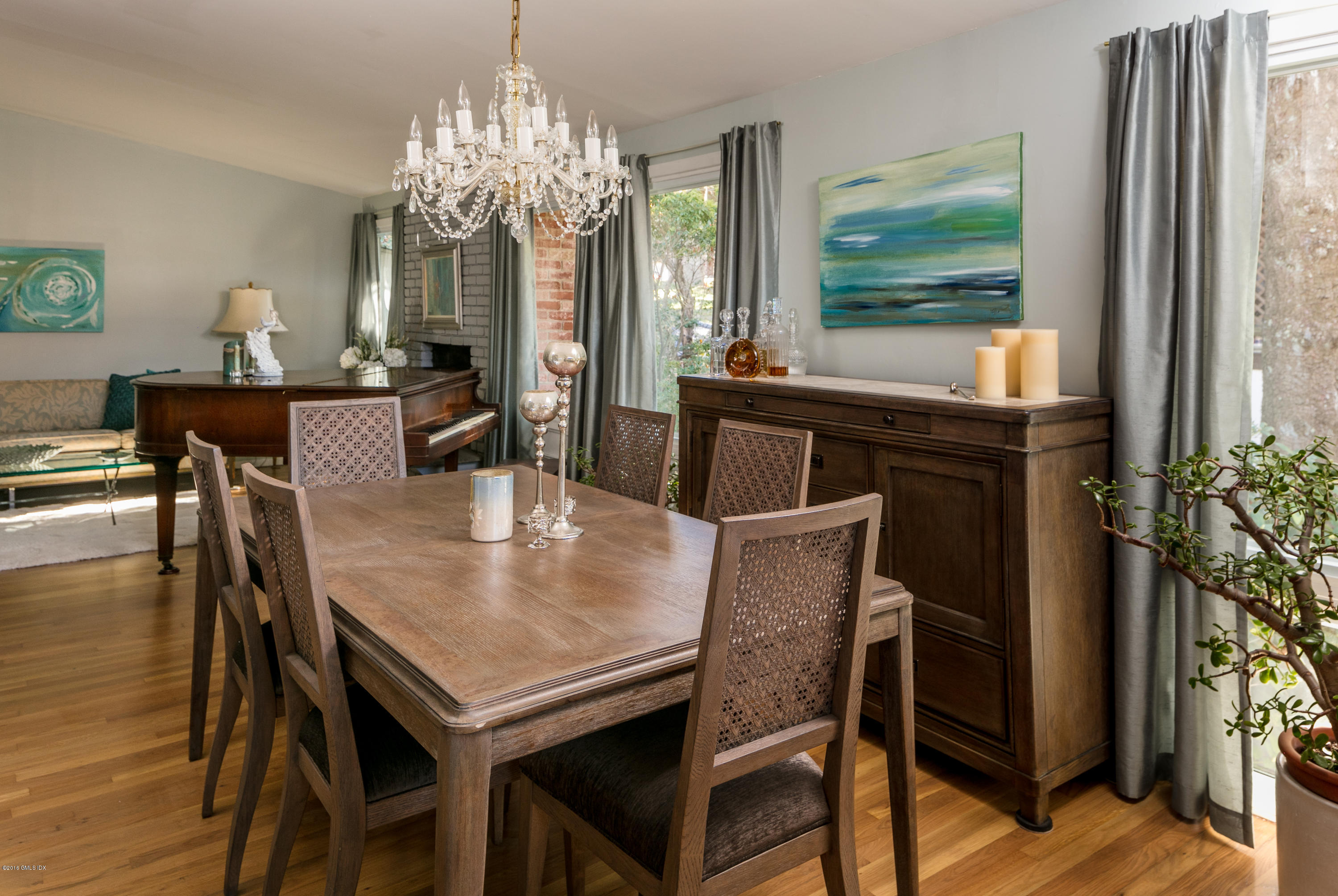 7 Crawford Terrace Riverside, CT 06878 - Photo 8 of 19 a dining room with furniture a chandelier and window