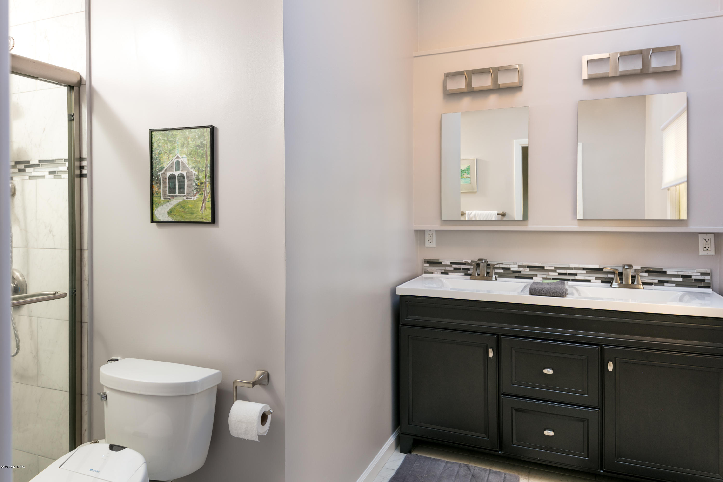 7 Crawford Terrace Riverside, CT 06878 - Photo 10 of 19 a bathroom with a toilet sink and mirror