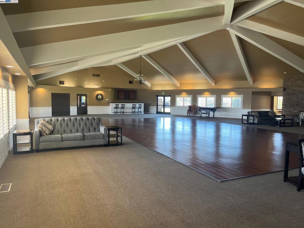 1085 Tasman Sunnyvale, CA 94089 - Photo 24 of 33 a living room with furniture and a fireplace