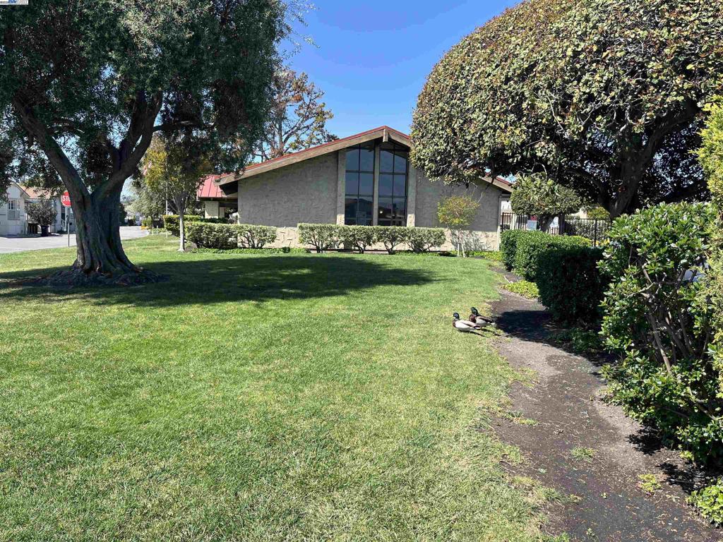 1085 Tasman Sunnyvale, CA 94089 - Photo 30 of 33 a front view of house with yard and green space
