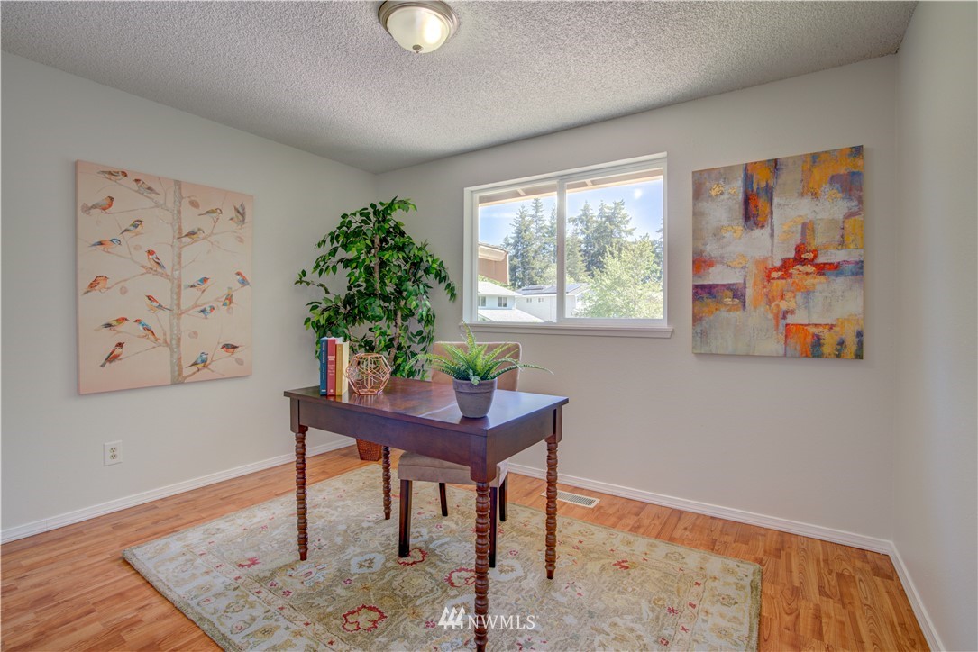 2103 Southeast 21st Street Renton, WA 98055 - Photo 11 of 23 a workspace with furniture and a window