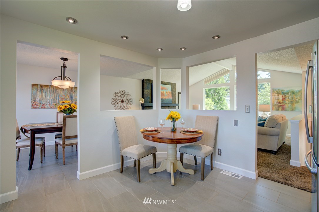 2103 Southeast 21st Street Renton, WA 98055 - Photo 8 of 23 a dining room with furniture and window