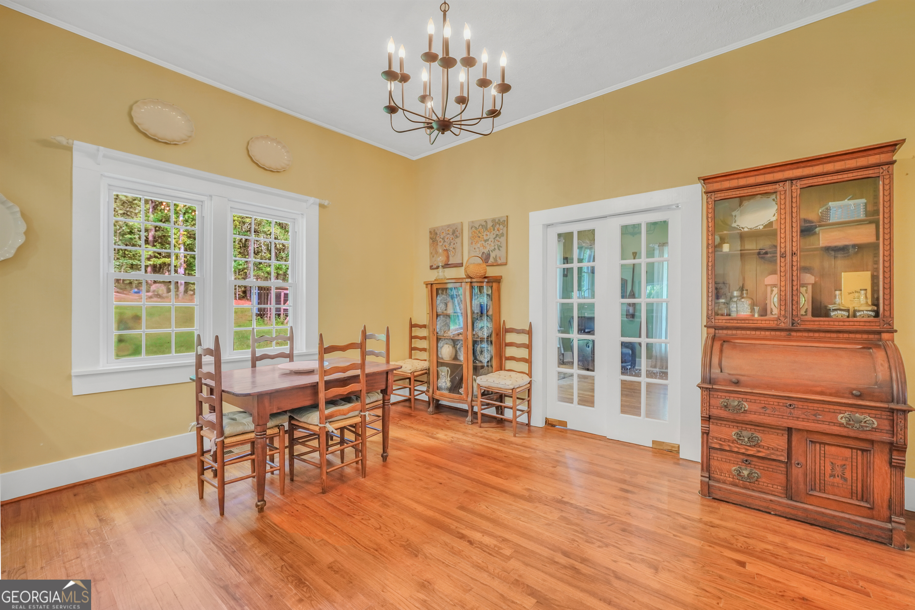 686 Burkett Road Thomaston, GA 30286 - Photo 13 of 70 a view of a dining room with furniture window and wooden floor