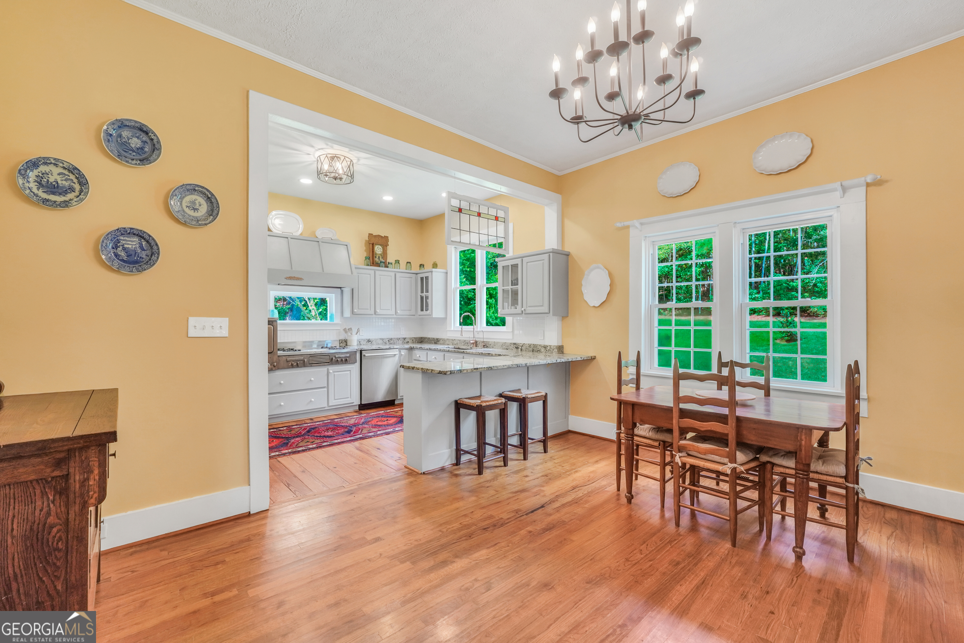 686 Burkett Road Thomaston, GA 30286 - Photo 15 of 70 a view of a dining room with furniture window and wooden floor