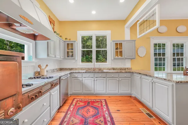 a bedroom with a bed and a fireplace
