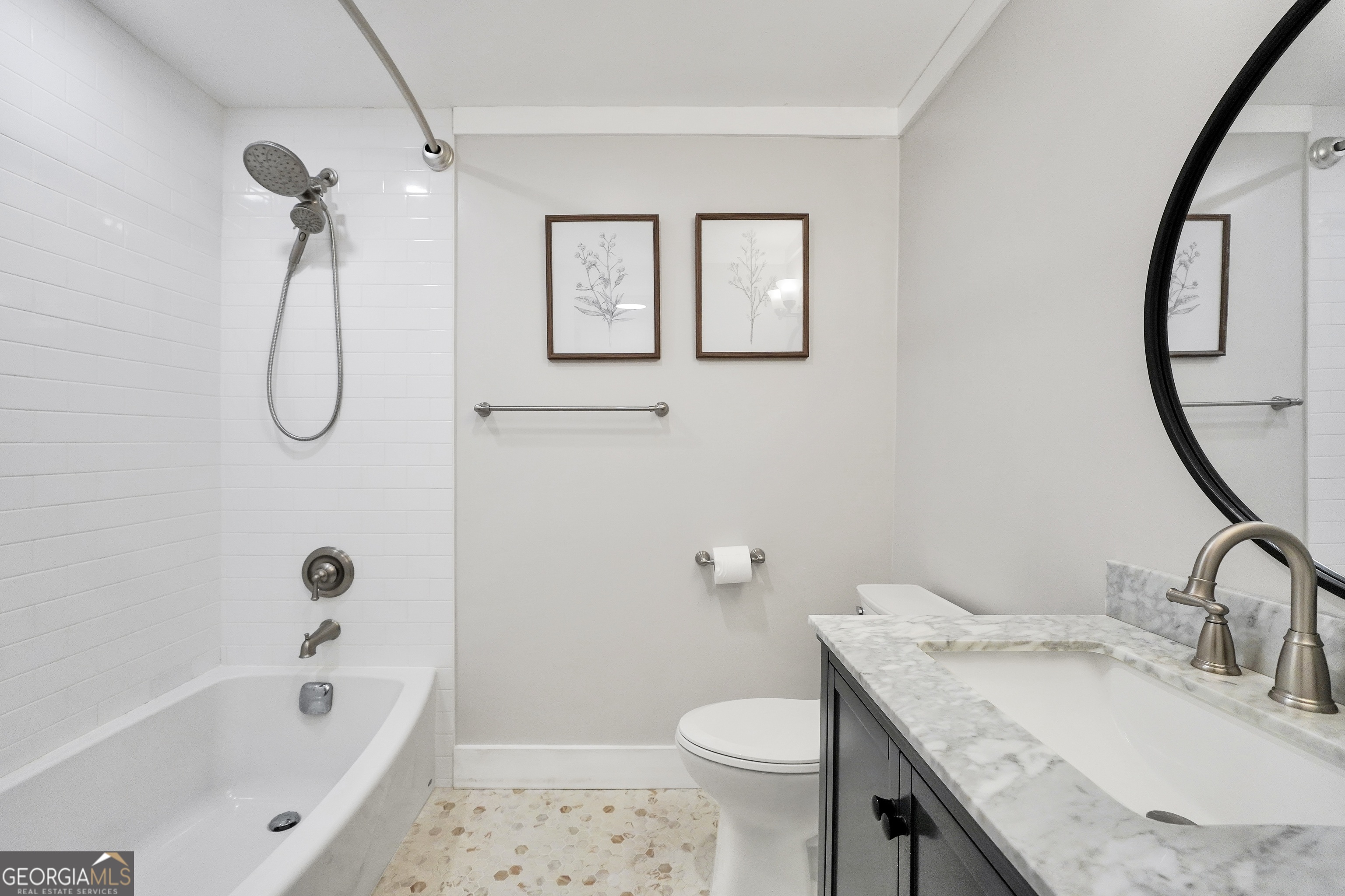 686 Burkett Road Thomaston, GA 30286 - Photo 24 of 70 a bathroom with a granite countertop sink toilet and shower