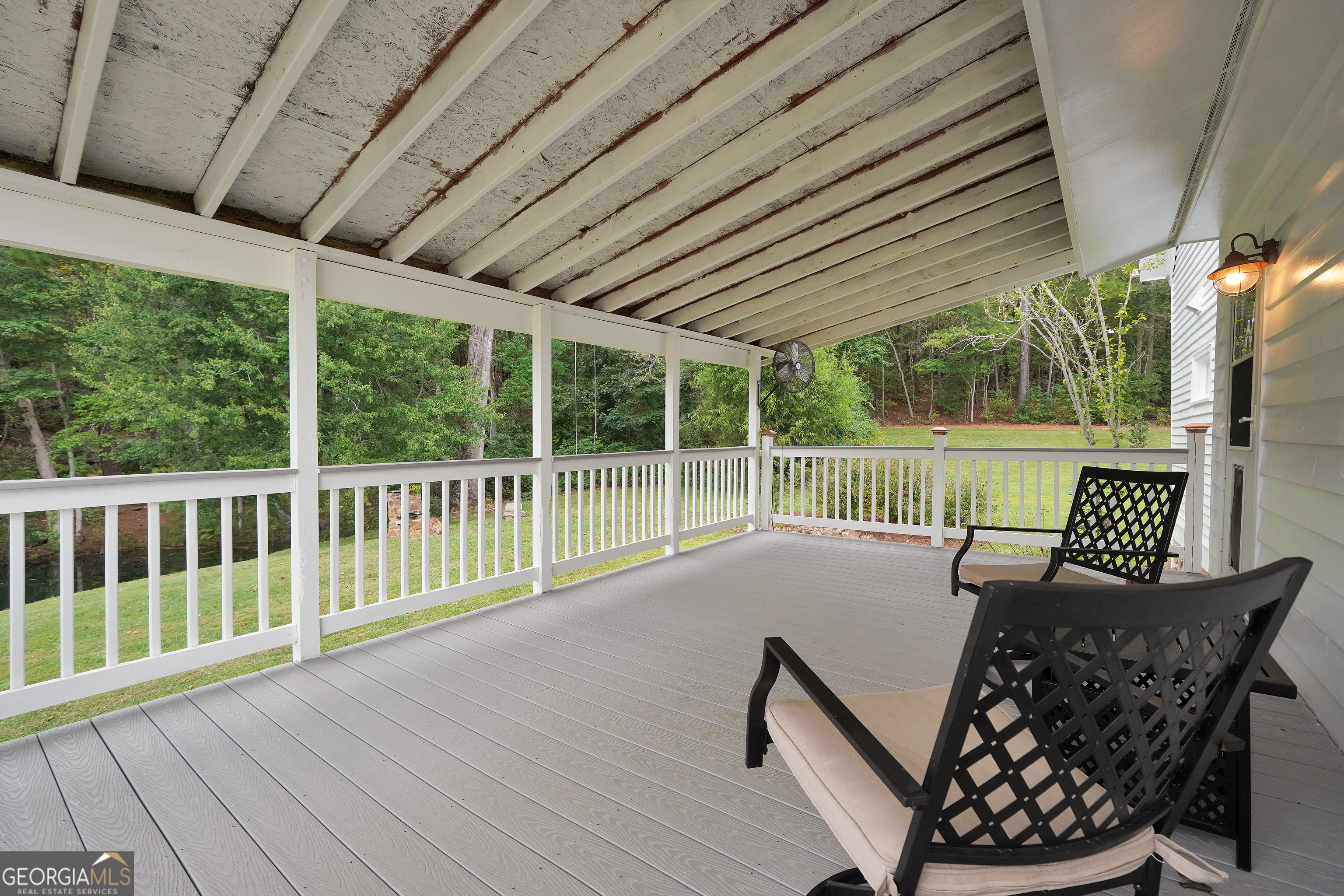 686 Burkett Road Thomaston, GA 30286 - Photo 35 of 70 a view of a chairs and table in the deck