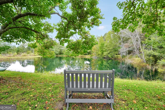 a kitchen with a refrigerator and a sink