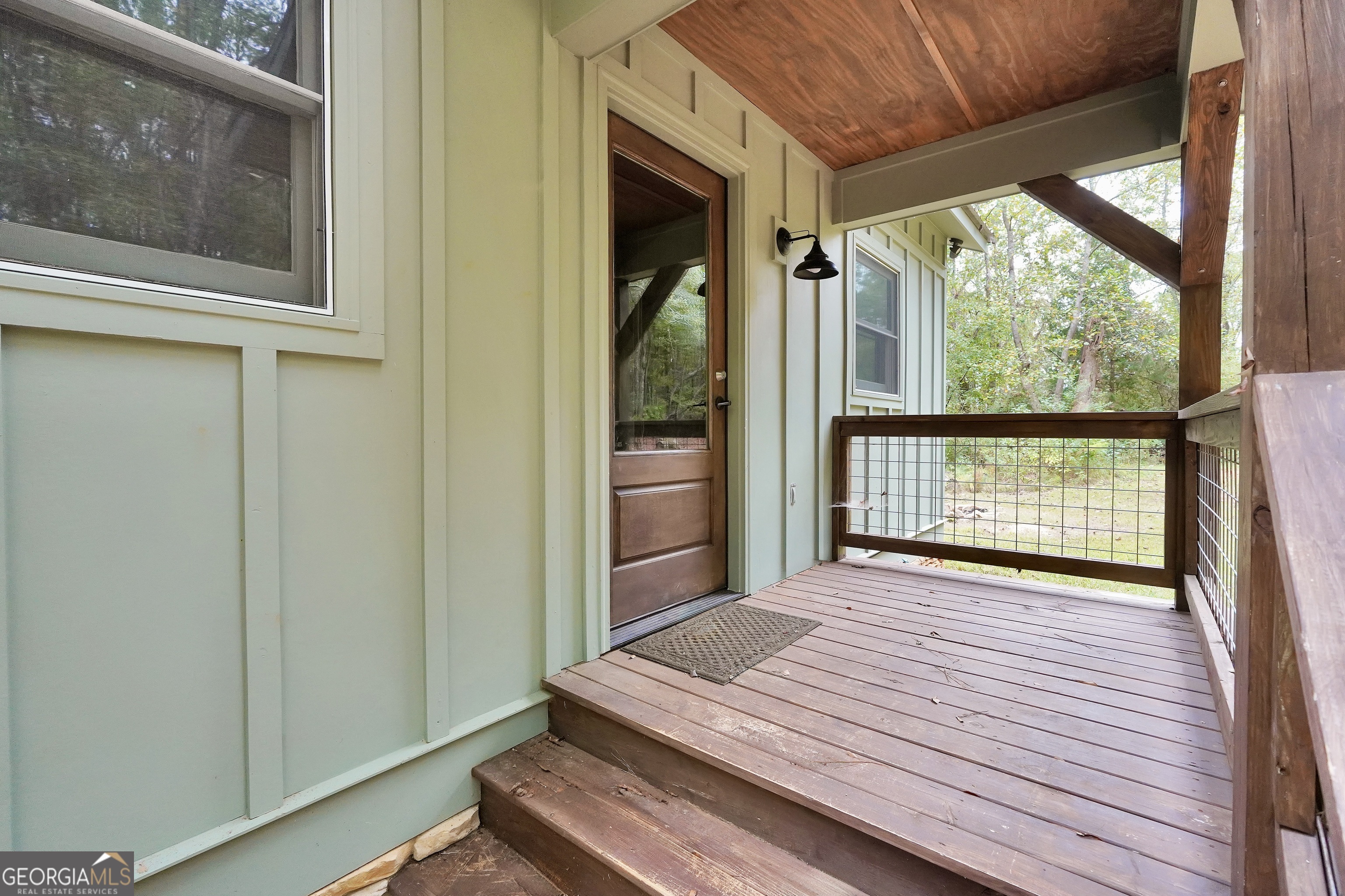 686 Burkett Road Thomaston, GA 30286 - Photo 57 of 70 a view of a balcony with wooden floor