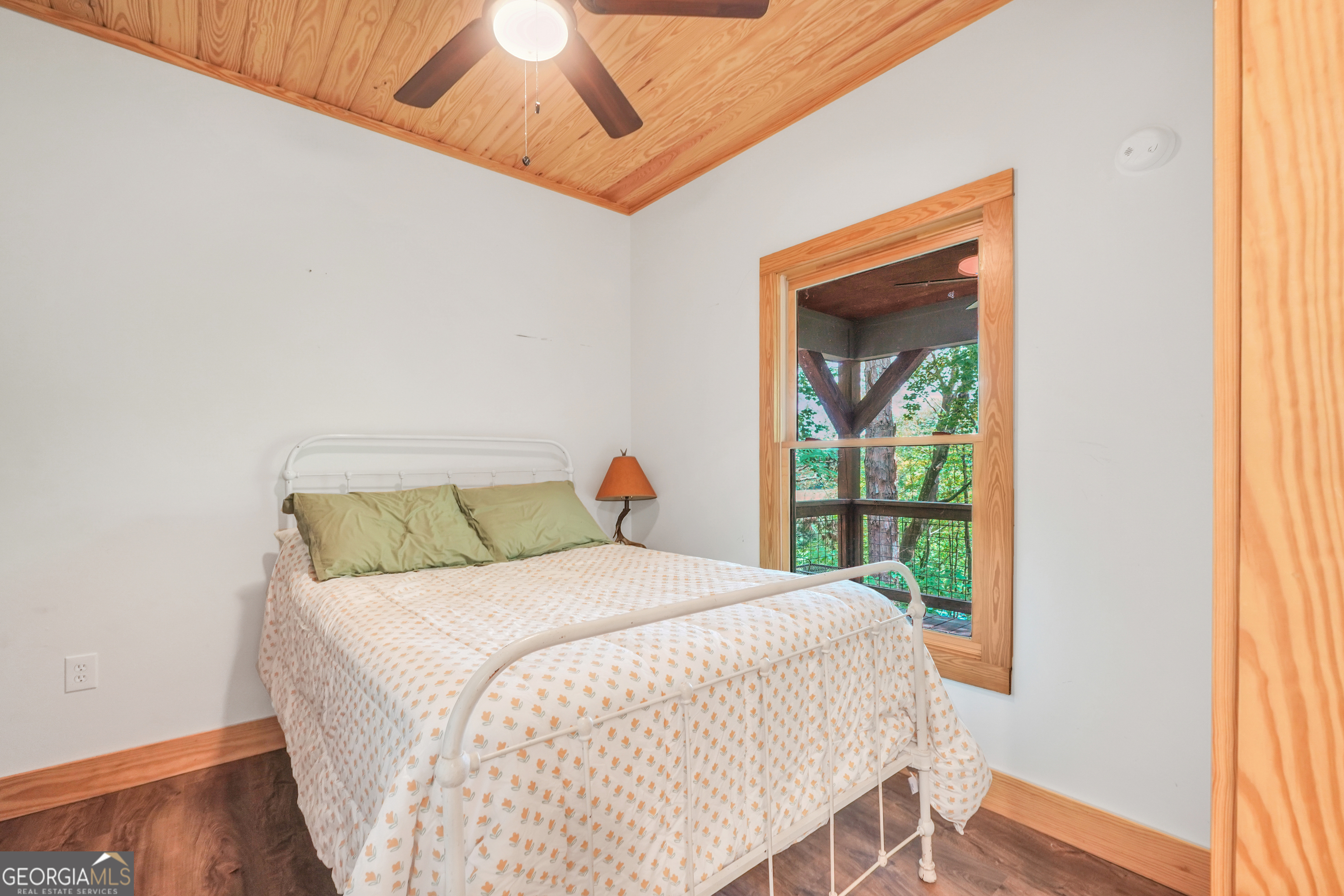 686 Burkett Road Thomaston, GA 30286 - Photo 62 of 70 a bedroom with a bed and a window