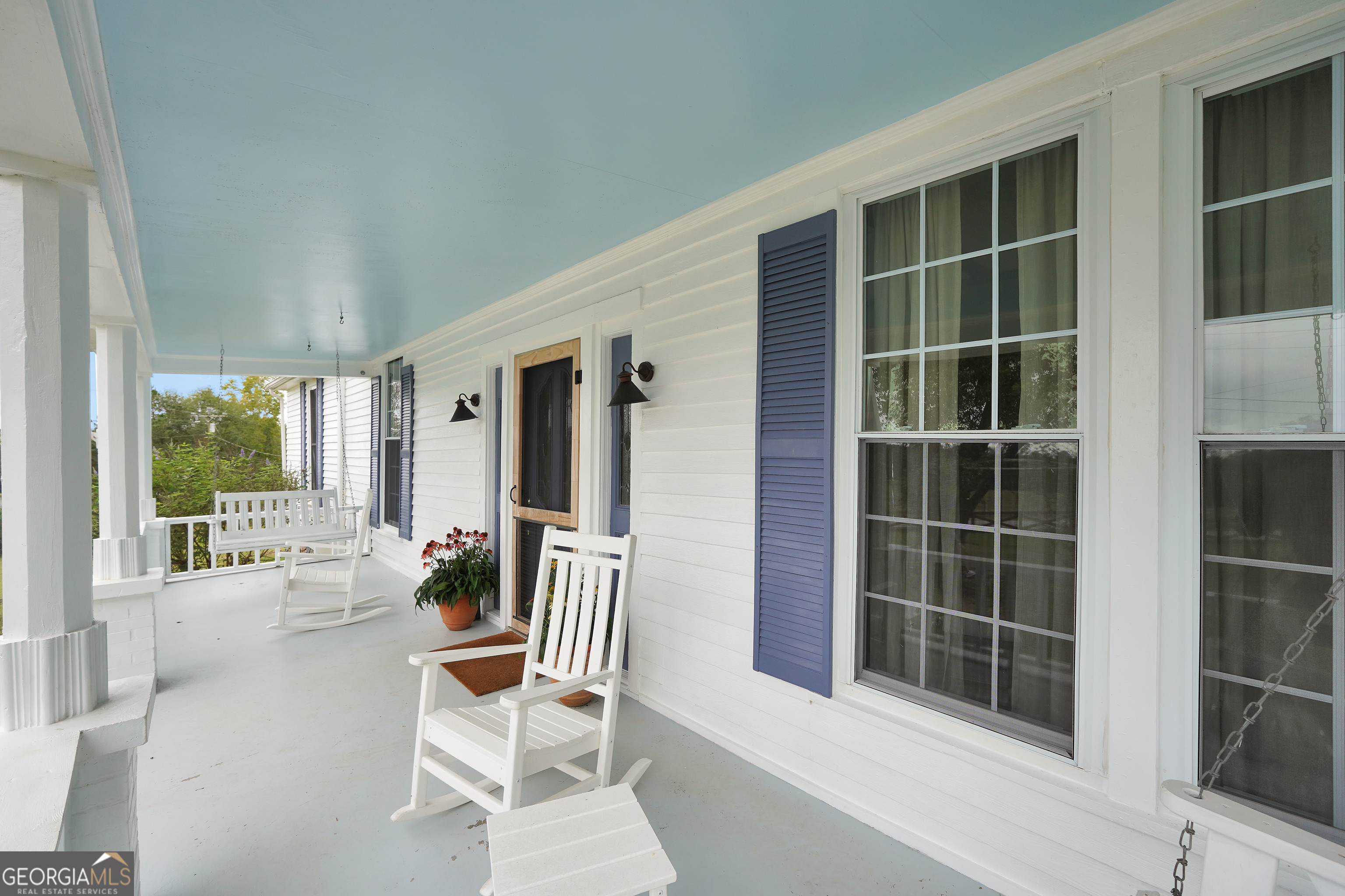 686 Burkett Road Thomaston, GA 30286 - Photo 7 of 70 a view of an chairs and table in a balcony