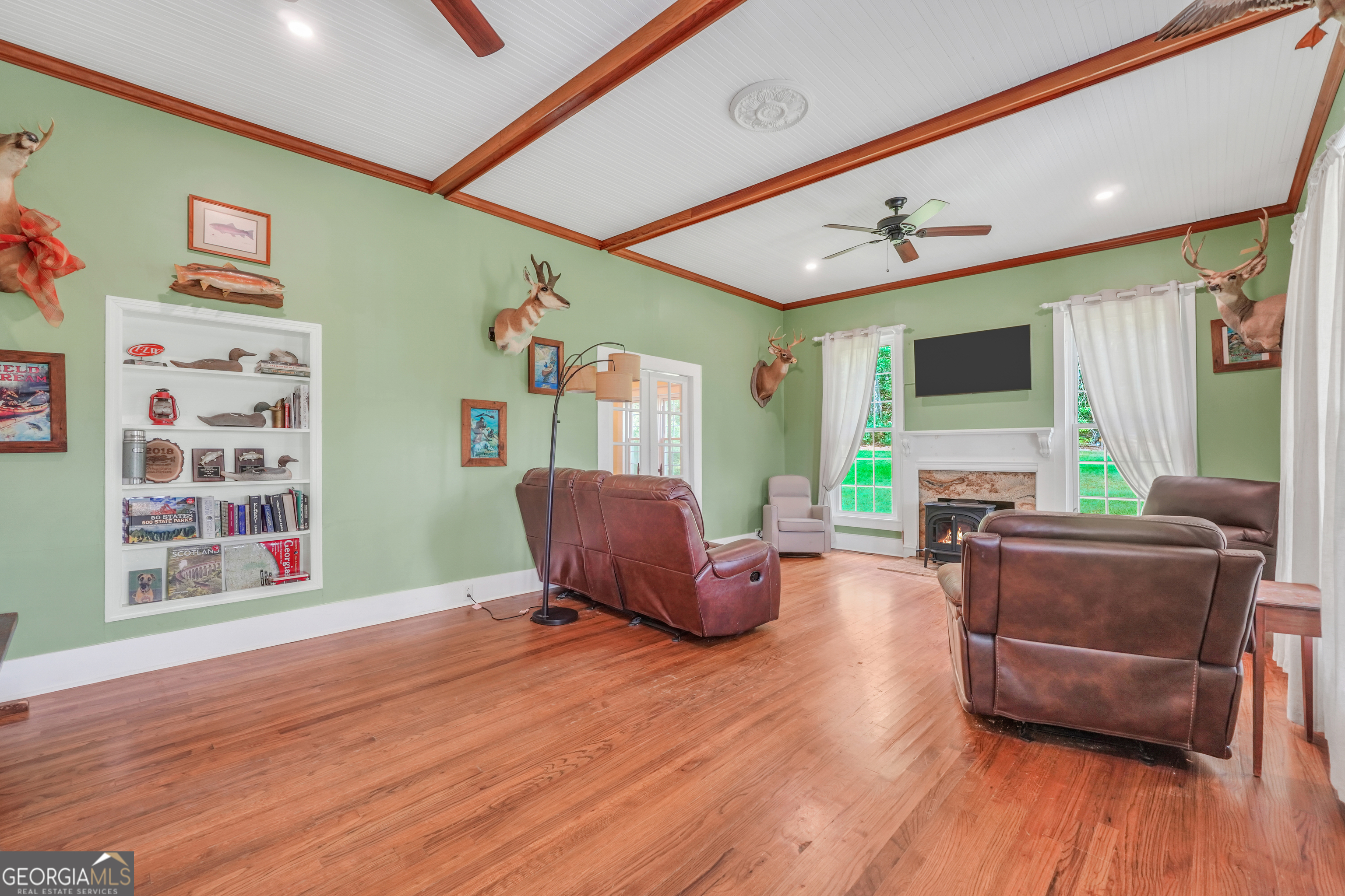 686 Burkett Road Thomaston, GA 30286 - Photo 9 of 70 a living room with furniture and a flat screen tv