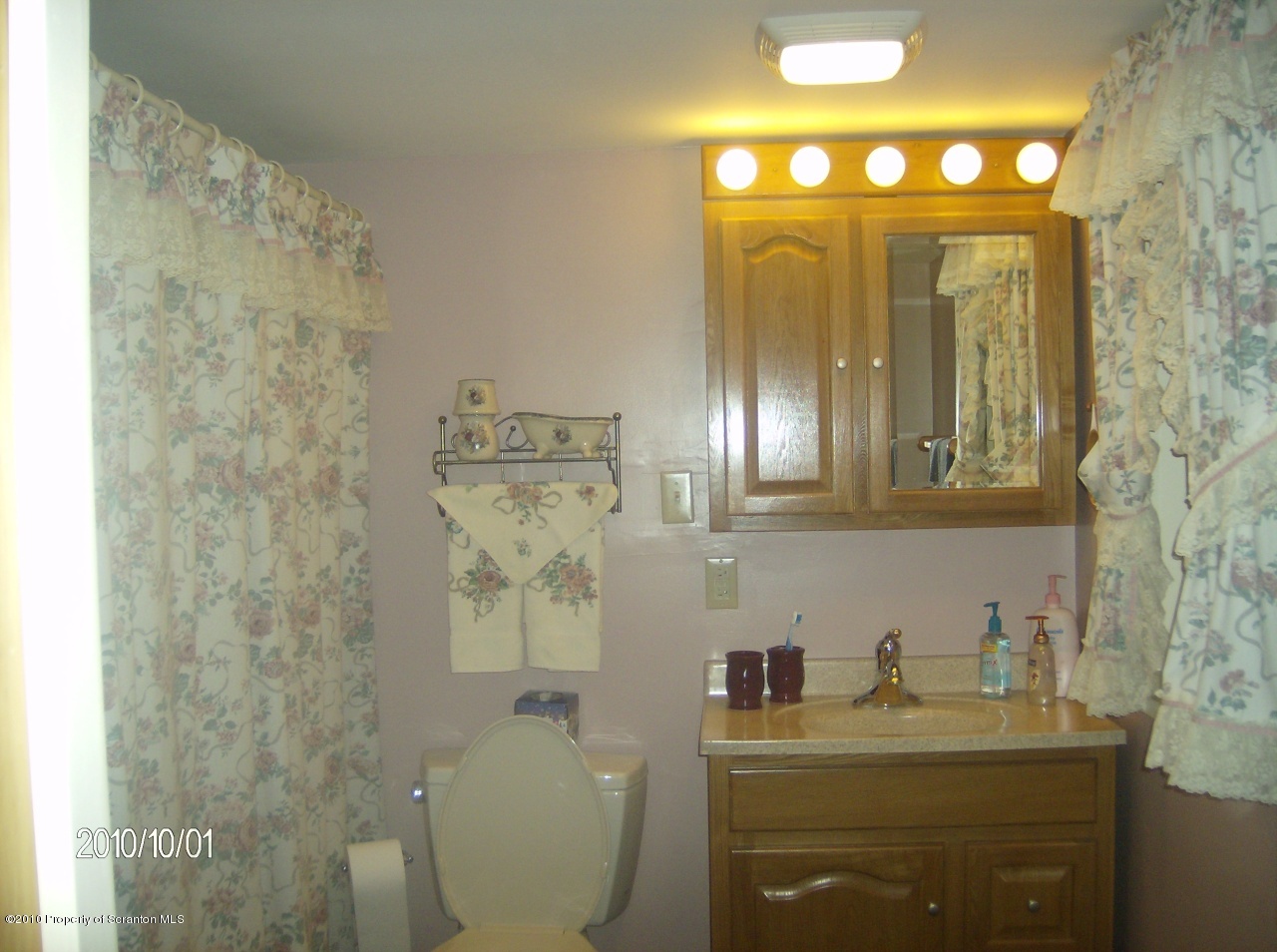 3 Rr Nicholson, PA 18446 - Photo 12 of 16 a bathroom with a granite countertop sink toilet and mirror