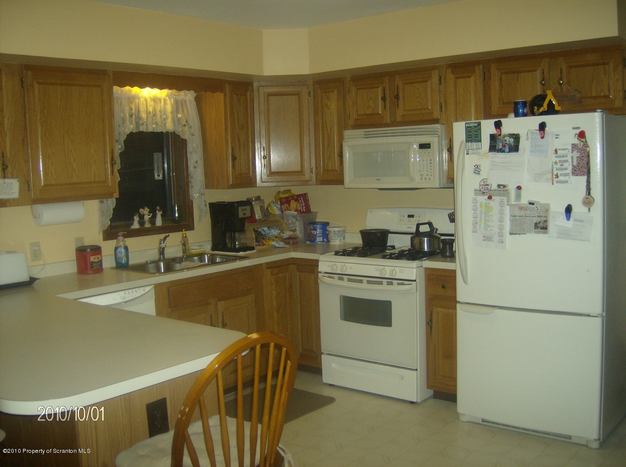3 Rr Nicholson, PA 18446 - Photo 3 of 16 a kitchen with refrigerator and cabinets
