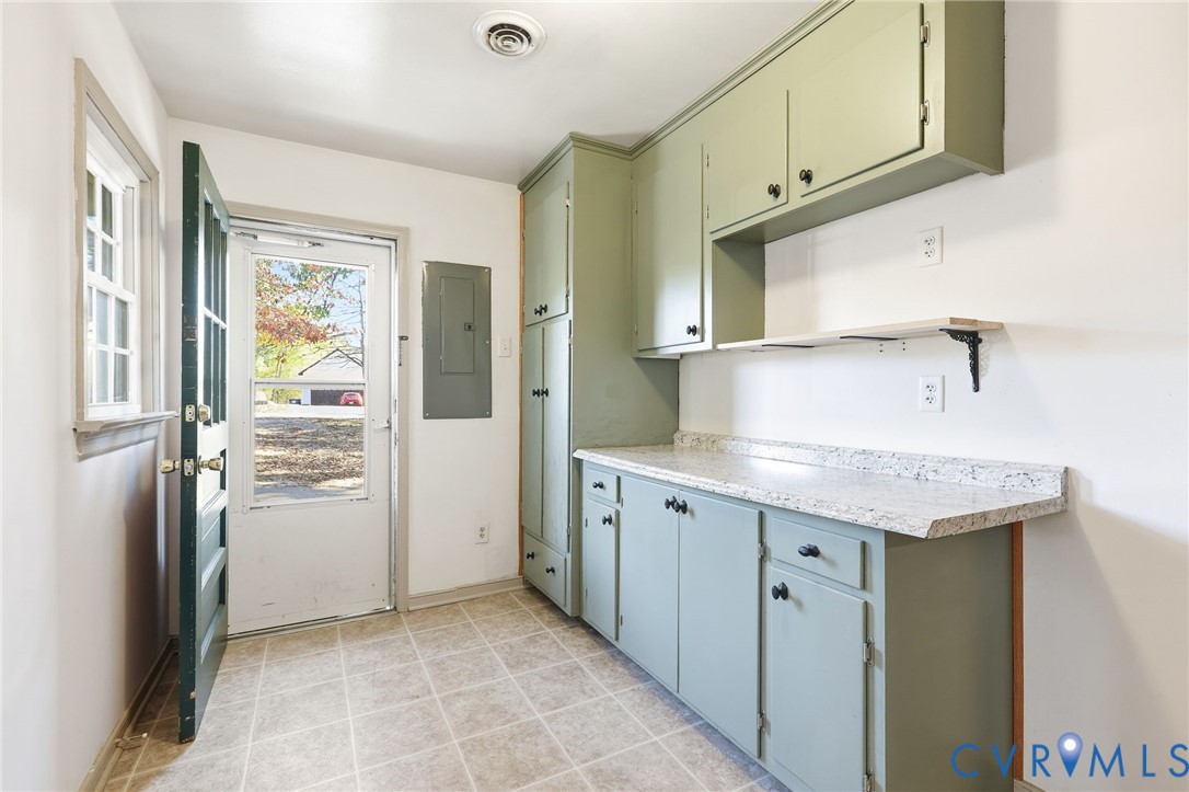 12673 Winfree Street Chester, VA 23831 - Photo 16 of 31 a kitchen with stainless steel appliances granite countertop a refrigerator and a stove