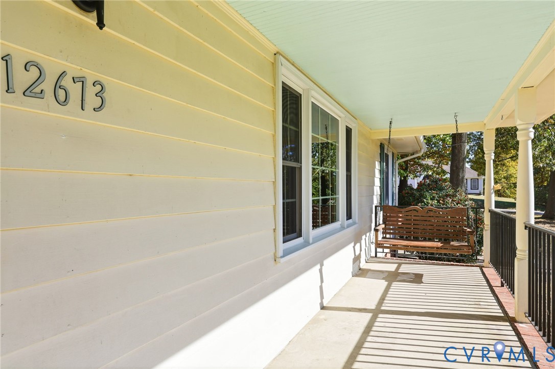12673 Winfree Street Chester, VA 23831 - Photo 9 of 31 a bathroom with a bathtub and a shower